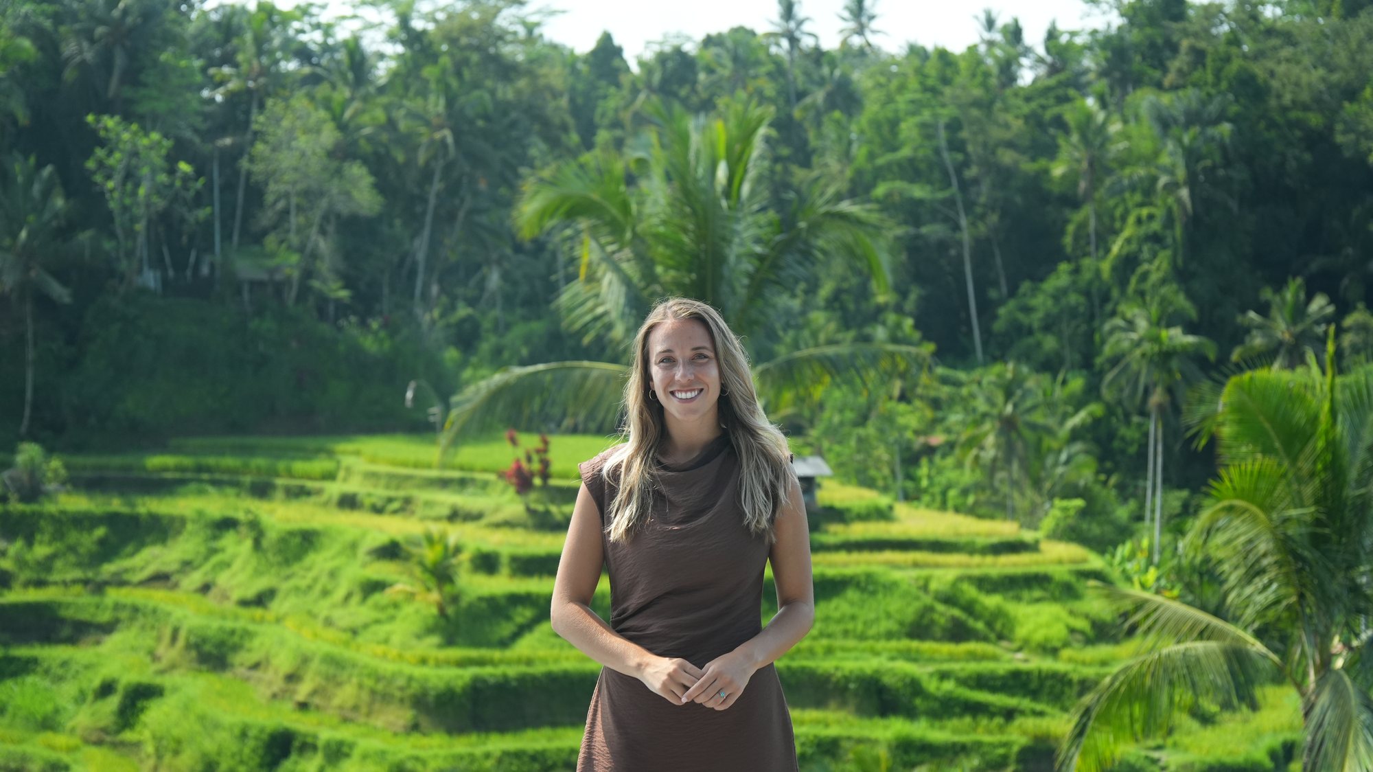 Caitlin, founder of The Aisle Advisors, in the rice terraces of Bali